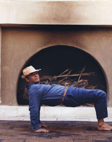 shoe designer christian louboutin practices yoga at his retreat near aswân, egypt