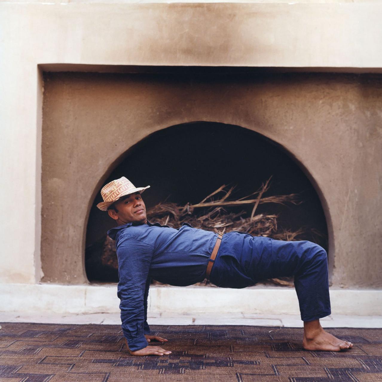 shoe designer christian louboutin practices yoga at his retreat near aswân, egypt